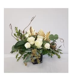 Gold and Roses 2026. An arrangement by Northwest Florist.