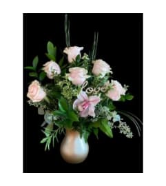 Forever Yours. An arrangement by Avenue Florist.