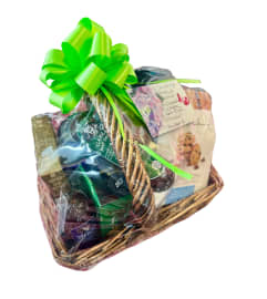 Delicious Sweet and Savory Snack Basket. An arrangement by Bouquets N Things.