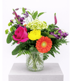 Cute As A Button Vase. An arrangement by The Garden Gate Gifts and Florals.