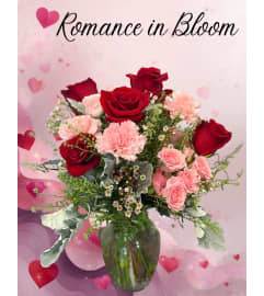 Romance in Bloom. An arrangement by Flower Barn.