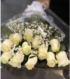 Dozen White Rose Bouquet. An arrangement by Grace Floral Design Barrie. Dozen White Rose Bouquet. An arrangement by Grace Floral Design Barrie.