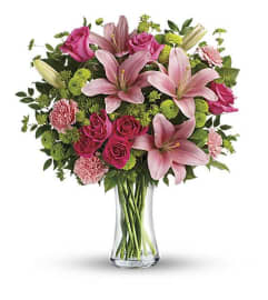 Blush and Bloom Bouquet. An arrangement by Leland Florist.
