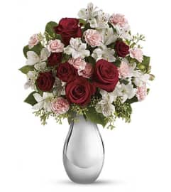 Radiant Romance Garden. An arrangement by Leland Florist.