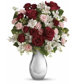 Radiant Romance Garden. An arrangement by Leland Florist. Radiant Romance Garden. An arrangement by Leland Florist.