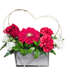Heartfelt Blooms. An arrangement by Harriet's Flower and Gift Shop.