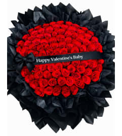 Roses are Red. An arrangement by Geni's Florist and Gifts.