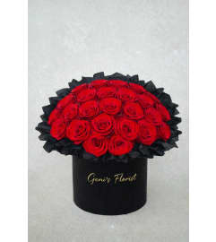 Infinity Red Roses Box. An arrangement by Geni's Florist and Gifts.