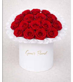 Red Roses in a Box. An arrangement by Geni's Florist and Gifts.