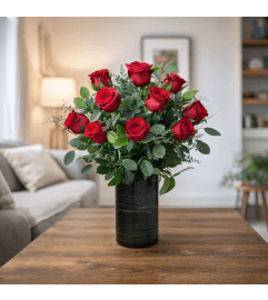 DELUXE RED ROSES. An arrangement by Petals and Co..