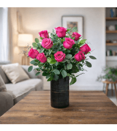 DELUXE HOT PINK ROSES. An arrangement by Petals and Co..