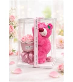 Plush in a Box. An arrangement by Geni's Florist and Gifts.