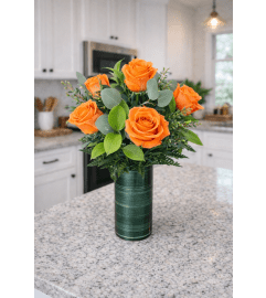 DELUXE ORANGE ROSES. An arrangement by Petals and Co..