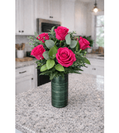 DELUXE HOT PINK ROSES. An arrangement by Petals and Co..
