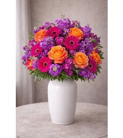 Sunset Glow Garden. An arrangement by Floral With a Twist.