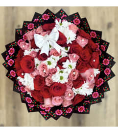 Rosy Embrace Bouquet. An arrangement by Vemongi Flowers.