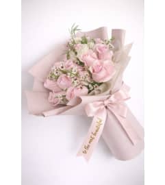 Miss Pink Roses. An arrangement by Geni's Florist and Gifts.