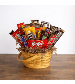 Sweet Tooth Candy Basket. An arrangement by Petals and Co..