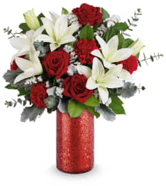 Scarlet Embrace Bouquet. An arrangement by North Liberty Flower Shop.
