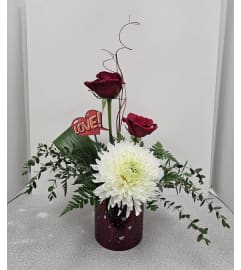 Pow! Right in the Kisser. An arrangement by Balloon Bouquets Plus.