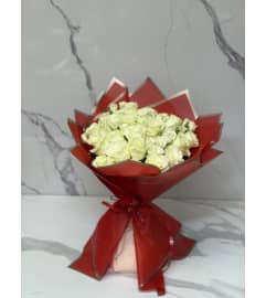 Two Dozen Premium White Roses. An arrangement by Grower's Flower Market and Gifts.