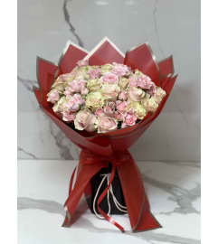 Two Dozen Premium Light Pink Roses. An arrangement by Grower's Flower Market and Gifts.