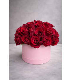 Red roses in box. An arrangement by Grower's Flower Market and Gifts.