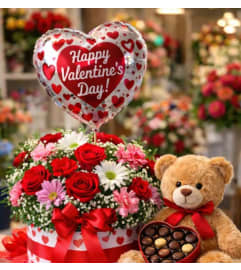 Valentines Day Bundle. An arrangement by Bertha's Florist.