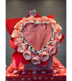 Pink Burn Reveal Bouquet. An arrangement by Bertha's Florist.