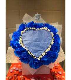 Blue Reveal Burn Bouquet 5. An arrangement by Bertha's Florist.