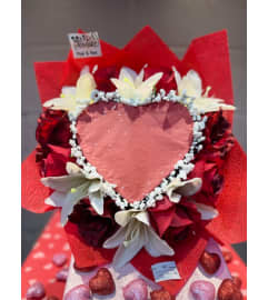 Burn Reveal Bouquet6. An arrangement by Bertha's Florist.