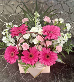 Daisy Delight Tote. An arrangement by Deep Creek Floral. Daisy Delight Tote. An arrangement by Deep Creek Floral.