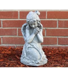 Girl Angel with Bow. An arrangement by North Liberty Flower Shop. Girl Angel with Bow. An arrangement by North Liberty Flower Shop.