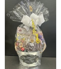 Medium Nutty Chocolatier Goodie basket. An arrangement by DMP Flowers and Gifts.