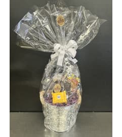 Small Nutty Chocolatier Goodie basket. An arrangement by DMP Flowers and Gifts.
