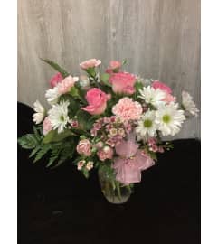 Pinkalicious. An arrangement by Roma Flowers and Gifts.