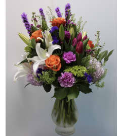 Marivel's Vibrant Joy. An arrangement by Marivel's Florist and Gifts.