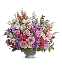 Teleflora's Love and Light Bouquet. An arrangement by Marivel's Florist and Gifts. Teleflora's Love and Light Bouquet. An arrangement by Marivel's Florist and Gifts.