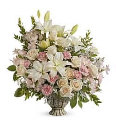 Teleflora's Peaceful Joy Bouquet. An arrangement by Marivel's Florist and Gifts.