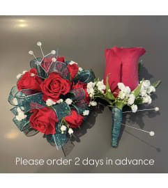 Red Mini Roses Duo. An arrangement by Violeta's Flower Shop.