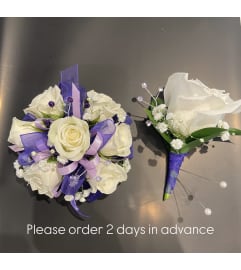 White and purple Duo. An arrangement by Violeta's Flower Shop.