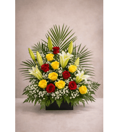 Red, Yellow Roses Symphathy Arrangement. An arrangement by EverBlooming Luxe Designs.