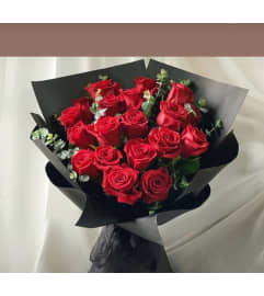 Red Roses Wrap. An arrangement by Brickell Glamour Flowers.