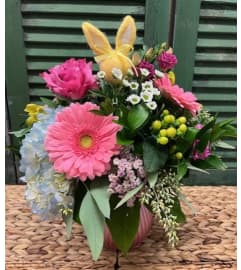Springtime Easter Cheer Arrangement. An arrangement by Forest Florist.