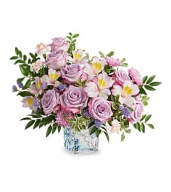 Written In The Sky by Teleflora. An arrangement by Jennings Florists.
