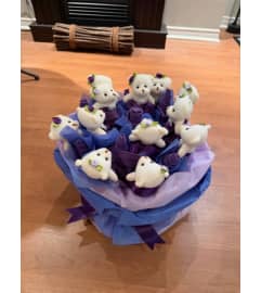Roung Teddy Bear Bouquet. An arrangement by Flamingo Floral and Gifts.