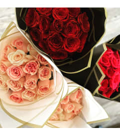 Signature Wrapped White Bouquet. An arrangement by Cincyfloralnista.