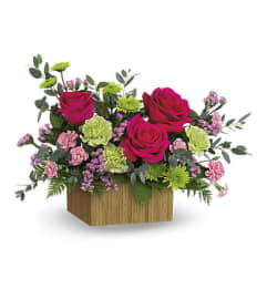 Teleflora's Chasing Sunsets Bouquet. An arrangement by Love Floral.
