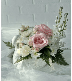 Swan Lake. An arrangement by Brooklin Floral and Garden Shoppe Inc..