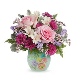 Teleflora's Dream in Bloom Bouquet. An arrangement by Michael's Flowers.